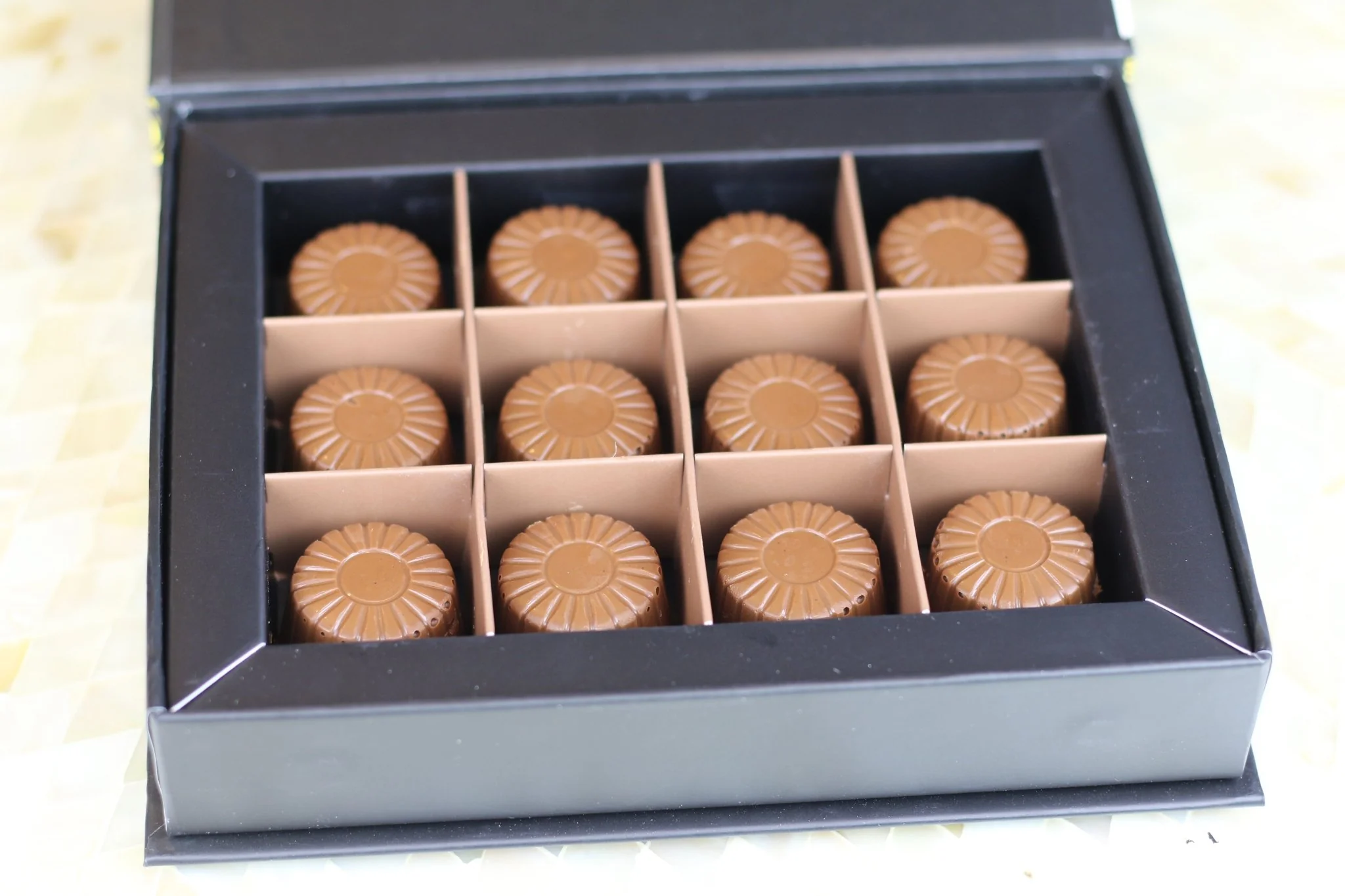 Rawmio Coconut Milk Chocolate Bonbons, 12 Bonbons - Image 8